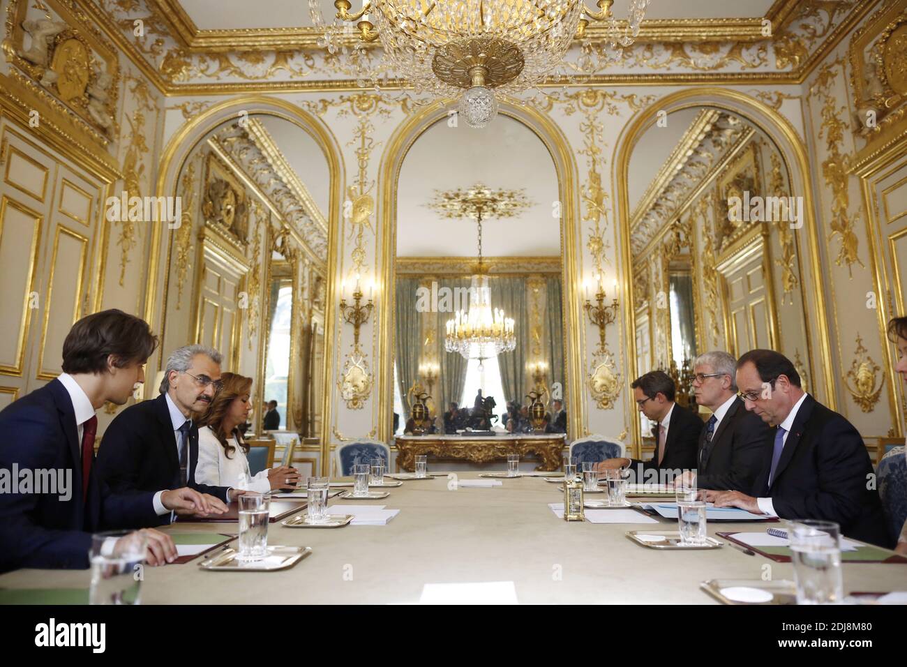 French President Francois Hollande receives Saudi business magnate, investor, and philanthropist Prince Al-Waleed Bin Talal bin Abdulaziz al Saud (Al-Walid ben Talal ben Abdelaziz Al Saoud) flanked by his Assisant Executive Manager for Travel and External Affairs Department Hassna Alturki for talks at the Elysee Palace in Paris, France on September 8, 2016. Photo by Denis Allard/Pool/ABACAPRESS.COM Stock Photo
