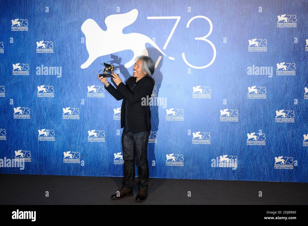 Director Lav Diaz poses with Golden Lion for Best Film for his movie 'The Woman who Left' during the Winners Photocall on the Lido in Venice, Italy as part of the 73rd Mostra, Venice International Film Festival on September 10, 2016. Photo by Aurore Marechal/ABACAPRESS.COM Stock Photo