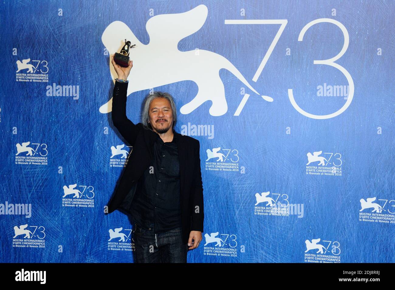 Director Lav Diaz poses with Golden Lion for Best Film for his movie 'The Woman who Left' during the Winners Photocall on the Lido in Venice, Italy as part of the 73rd Mostra, Venice International Film Festival on September 10, 2016. Photo by Aurore Marechal/ABACAPRESS.COM Stock Photo