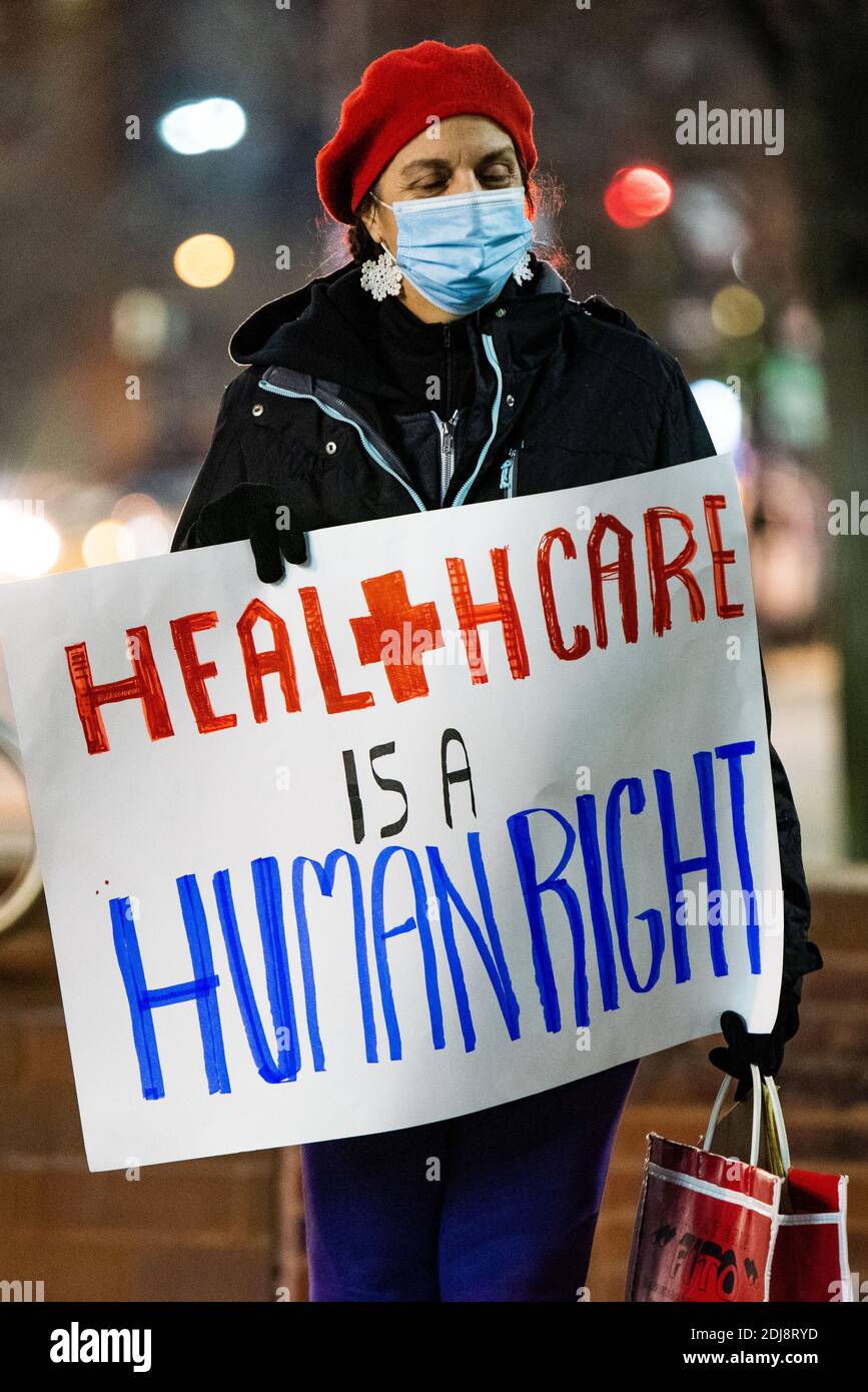 Philadelphia, Pennsylvania, USA. 12th Dec, 2020. Members of the statewide campaign, Put People First-PA, the Nonviolent Medicaid Army and the National Union for the Homeless, gathered in front of Temple University's North Philadelphia hospital campus bringing attention to the extreme pressures healthcare facilities are facing as the Covid-19 pandemic rages across the US, killing over 3000 people a day. The groups claim the root of the crisis is a healthcare system that puts profits over people resulting in short staffing, longer shifts, and inadequate protections. Members also gathered onli Stock Photo