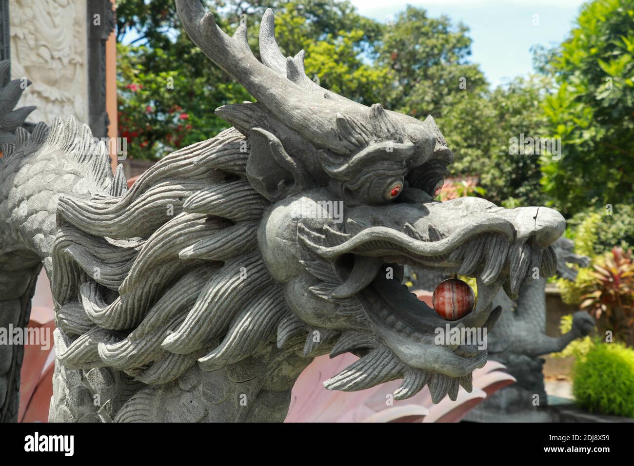 Sculpture of dragon in budhist temple Brahma Vihara-Arama Banjar in Lovina, Indonesia, Bali Stock Photo
