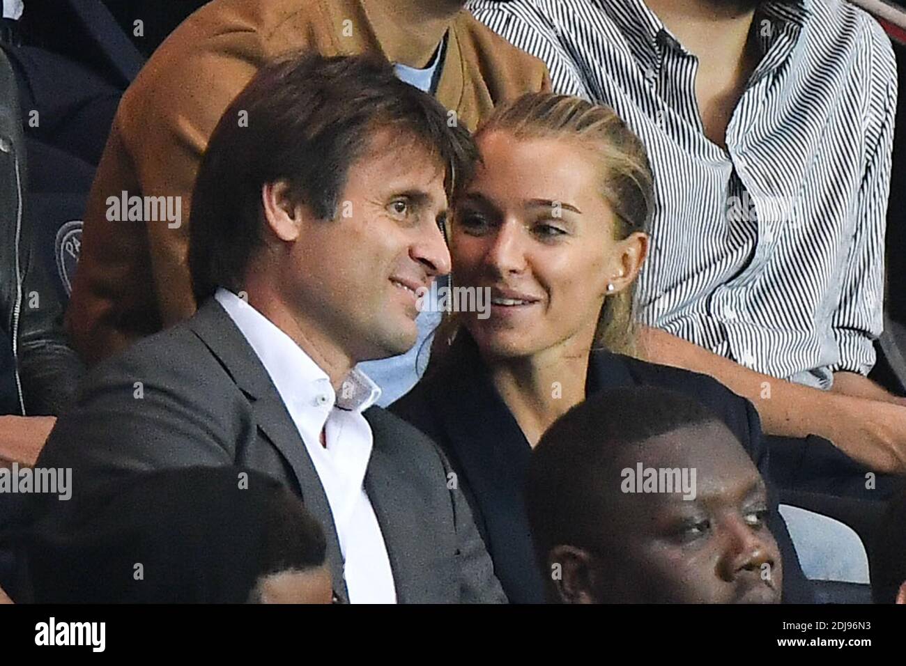 French former tennis player Fabrice Santoro and his wife attend the French  Ligue 1 game between Paris Saint-Germain and Dijon FCO at Parc des Princes  on September 20, 2016 in Paris, France.