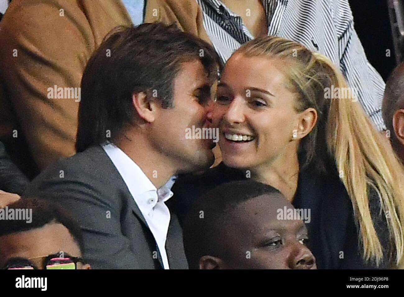 French former tennis player Fabrice Santoro and his wife attend the French  Ligue 1 game between Paris Saint-Germain and Dijon FCO at Parc des Princes  on September 20, 2016 in Paris, France.