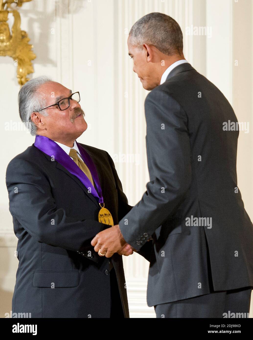 United States President Barack Obama presents the 2015 National Medal of Arts to Luis Valdez, Playwright, Actor, Writer, & Director of San Juan Bautista, California, during a ceremony in the East Room of the White House in Washington, DC, USA, on Thursday, September 22, 2016. Photo by Ron Sachs/CNP/ABACAPRESS.COM Stock Photo