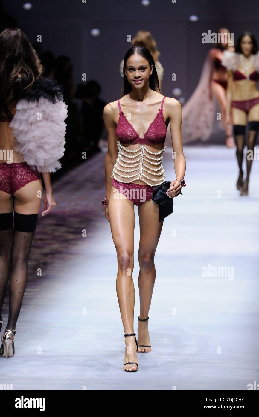 A model walks the runway at the Etam show as a part of Paris Fashion Week