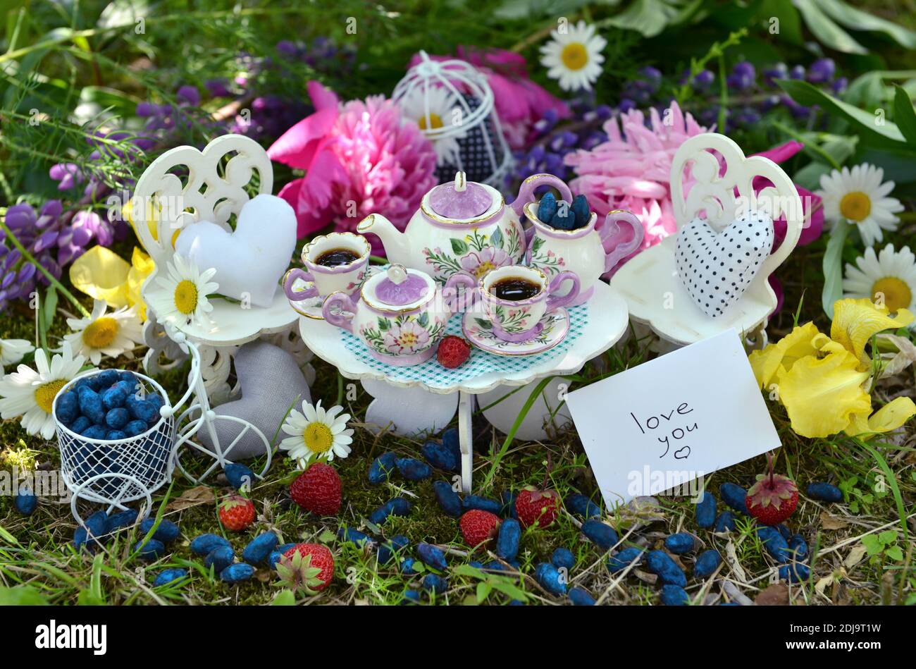 Alice in wonderland tea party blue tea Stock Photo - Alamy