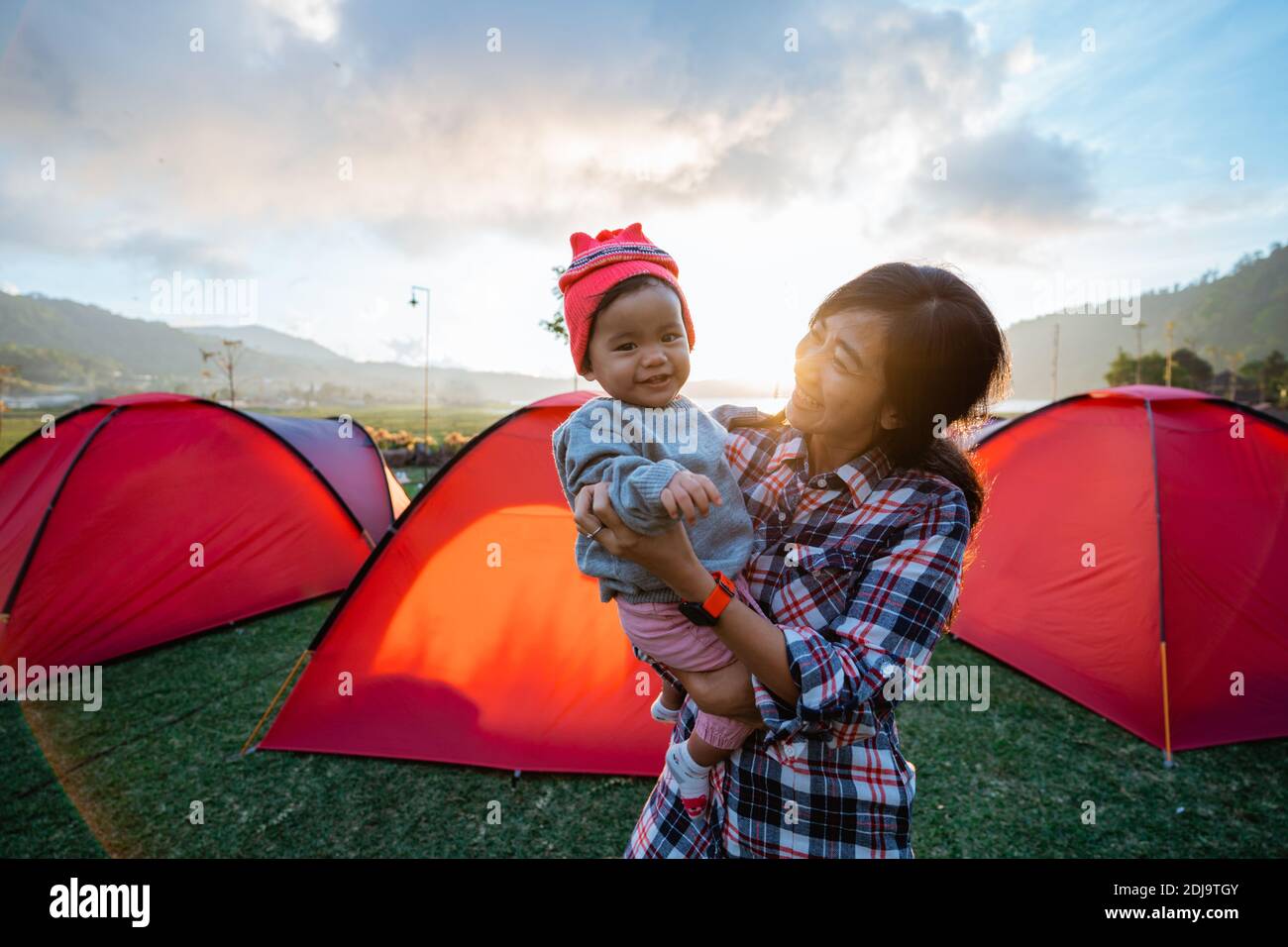 Portrait happy of the campground family with beautiful hill views Stock ...