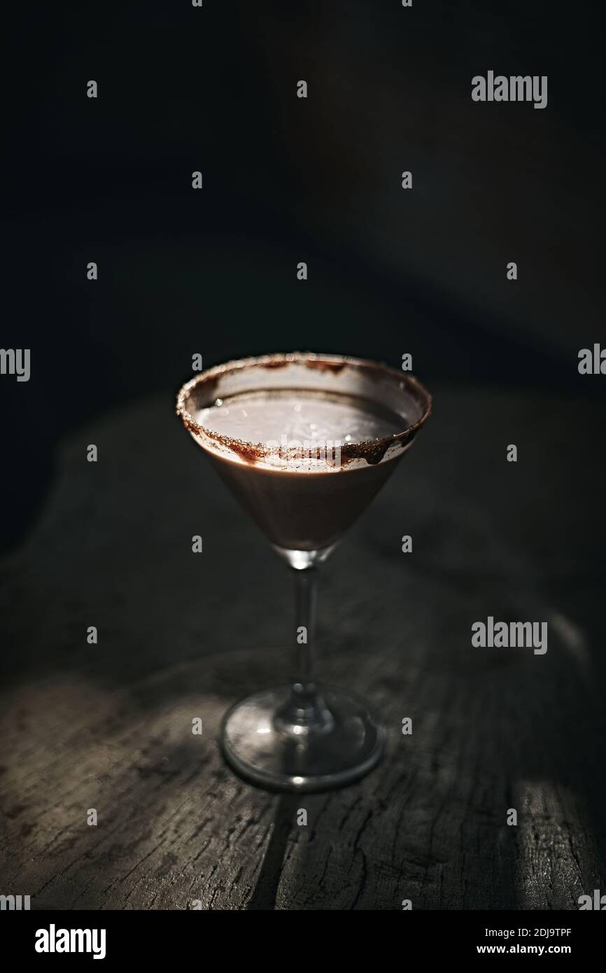 glasses of cream coffee cocktail or chocolate martini on wooden background Stock Photo