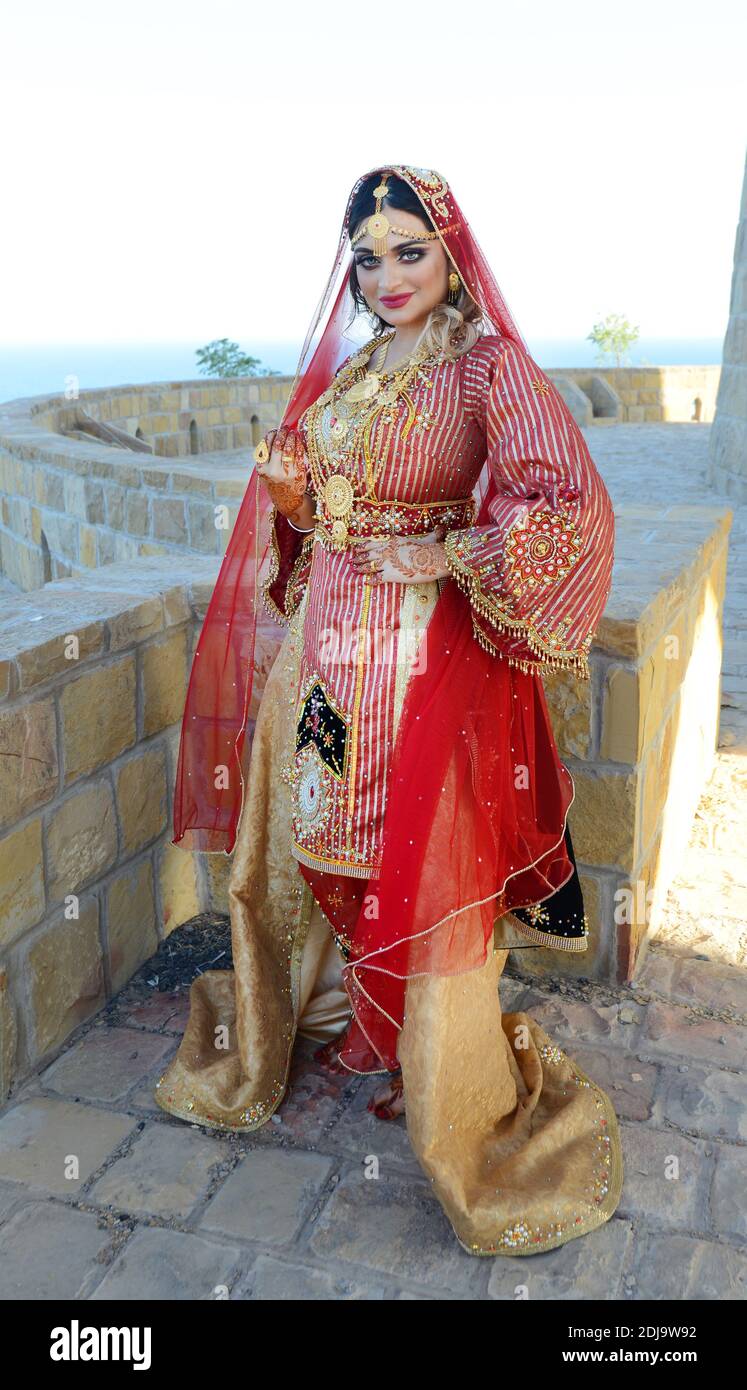 A beautiful model wearing a traditional Omani dress Stock Photo - Alamy