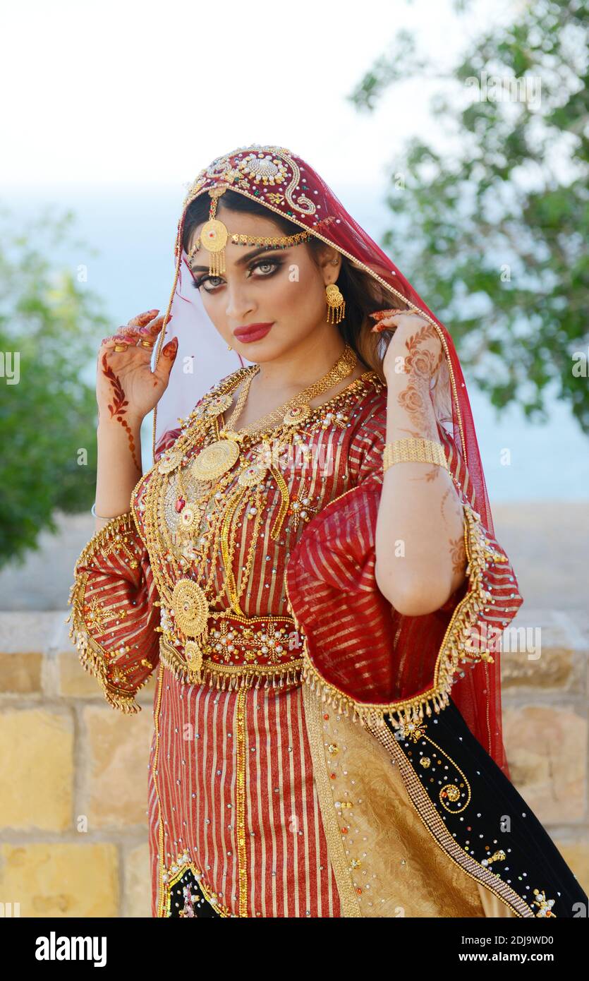A beautiful model wearing a traditional Omani dress Stock Photo Alamy