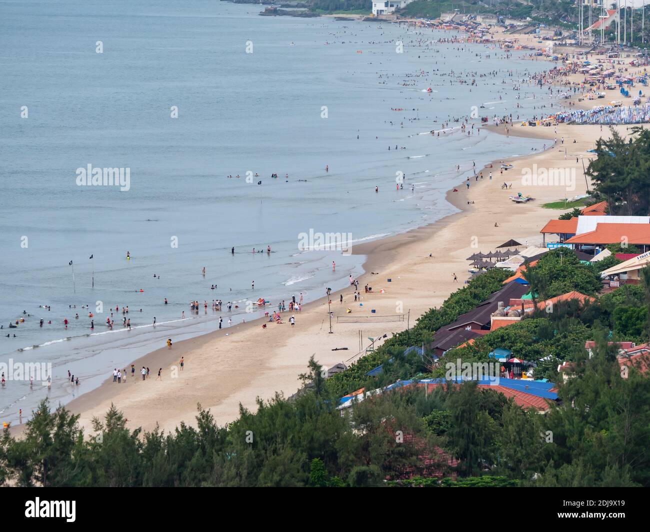 Bai Bien beach in Vung Tau in the Bang Ria-Vung Tau Province of South Vietnam, with restaurants, hotels and tourists. Stock Photo