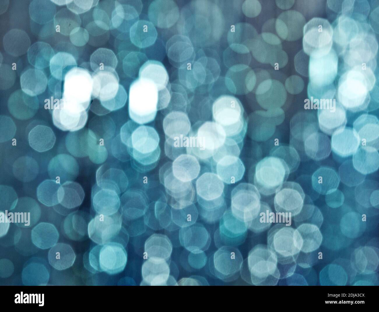 Christmas blue background with lights and bokeh Stock Photo - Alamy