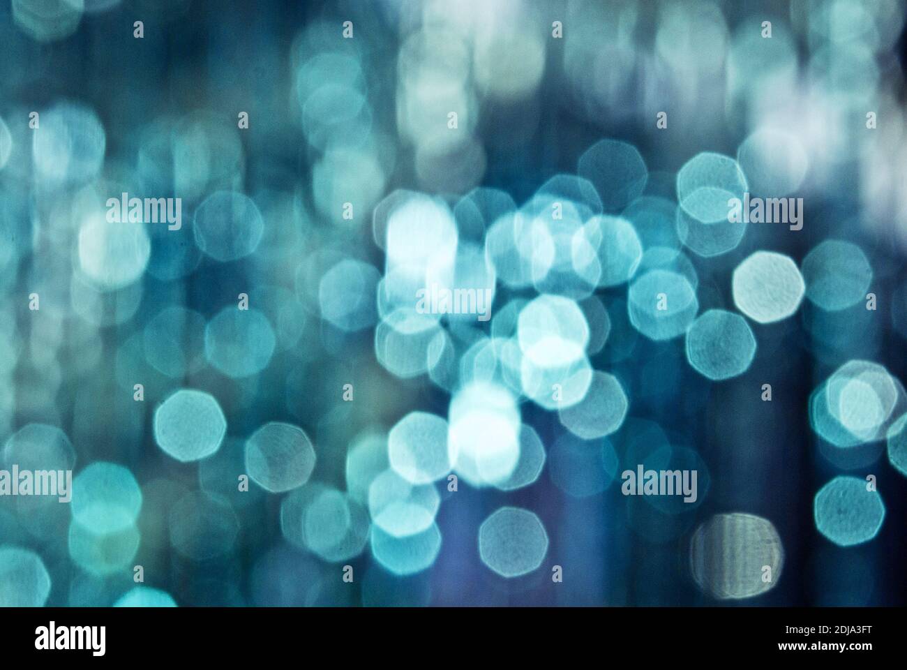 Christmas blue background with lights and bokeh Stock Photo - Alamy
