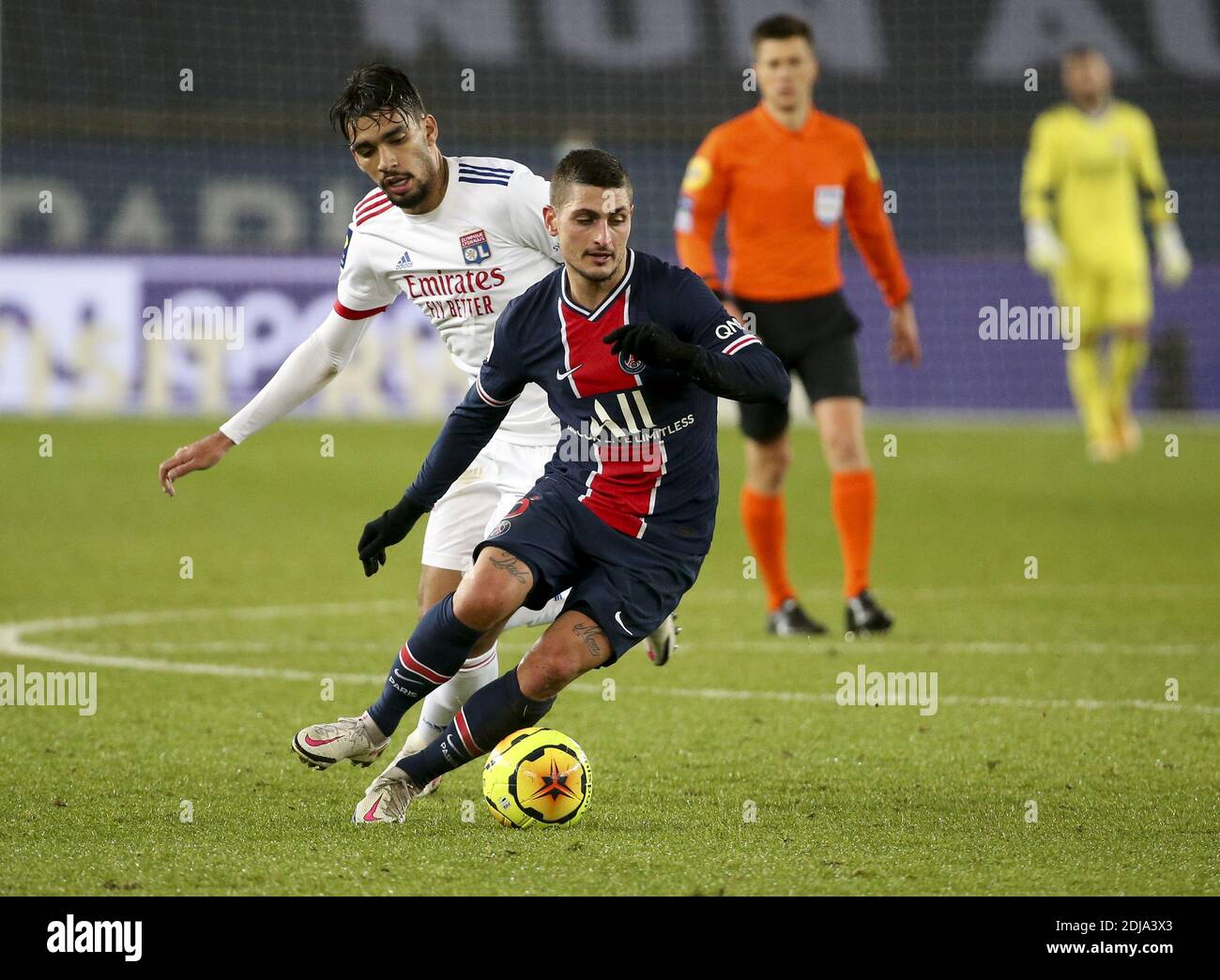 Marco Verratti of PSG, Lucas Paqueta of Lyon (left) during the French championship Ligue 1 football match between Paris Saint-Ge / LM Stock Photo