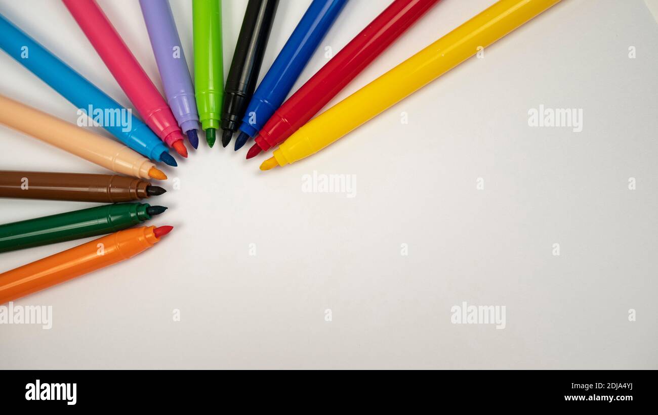 Different colors of markers on white background. Craft work design Stock Photo