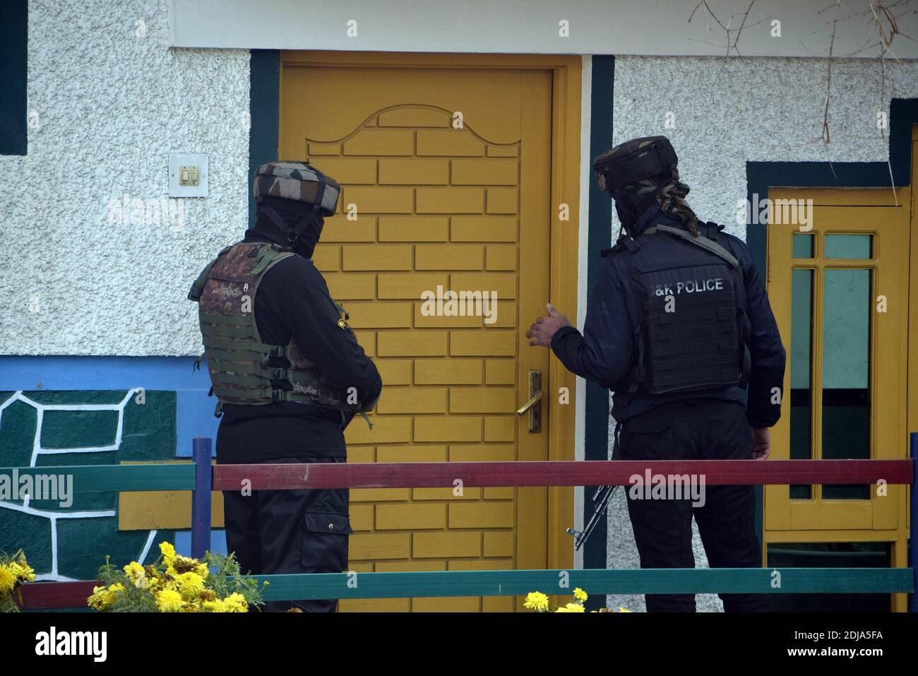 Srinagar, 14th December 2020. Police and SOG cordoned off the area after militants attacked the PDP leader Parvaiz Ahmad, at his residence in Natipora. Credit: Majority World CIC/Alamy Live News Stock Photo