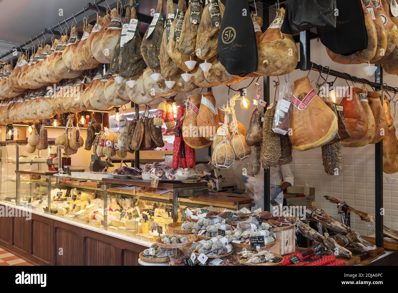 Traditional italian gastronomy shop with variable types of meat and cheese. Stock Photo