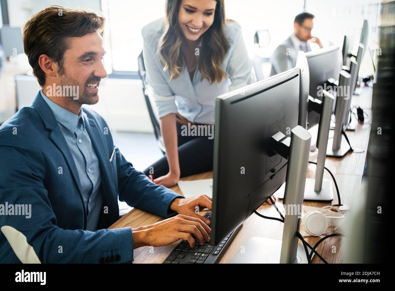 Programmer working in a software developing company Stock Photo - Alamy
