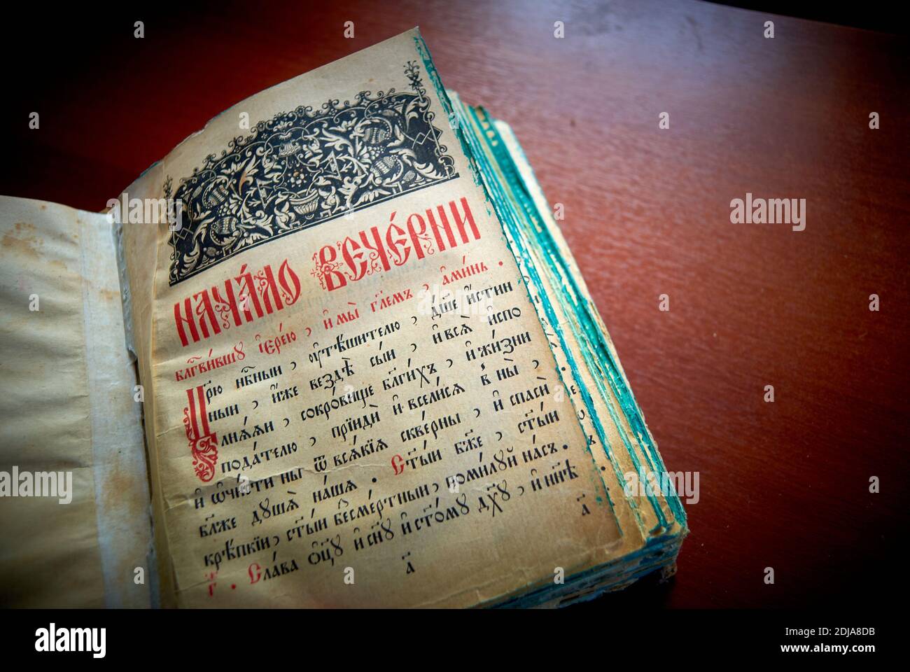 Astrakhan, Russia - 12.04.2011: Old liturgical book in Church Slavonic. The inscription in Russian: 'The beginning of Vespers' Stock Photo