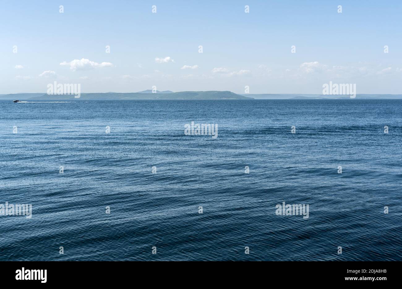 Beautiful sunset with clouds and sea Stock Photo - Alamy