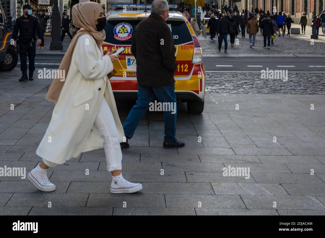 13 th December 2020. An arab woman in Puerta del Sol square. Madrid city, Spain. Stock Photo