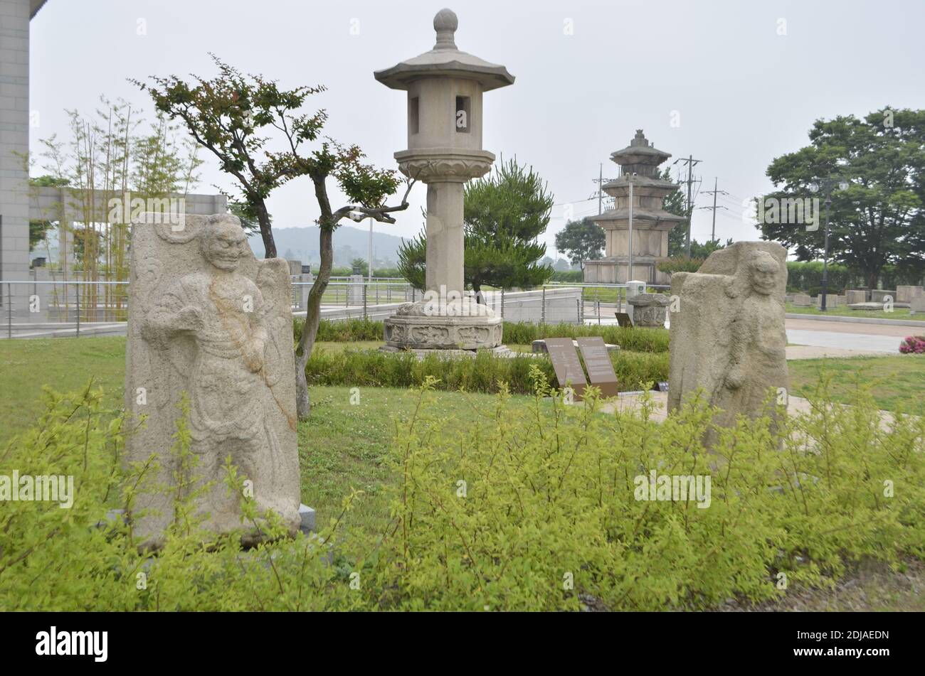 Stone guardians and stone lantern from the courtyard of the Gyeongju National Museum, South Korea Stock Photo