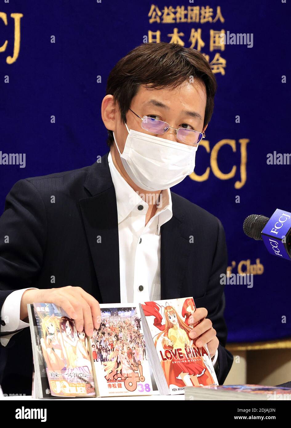Tokyo Japan 14th Dec Japanese Manga Comic Artist And Managing Director Of Japan Cartoonists Association Ken Akamatsu Displays His Comic Books As He Attends A Press Conference Against Manga Comic Piracy