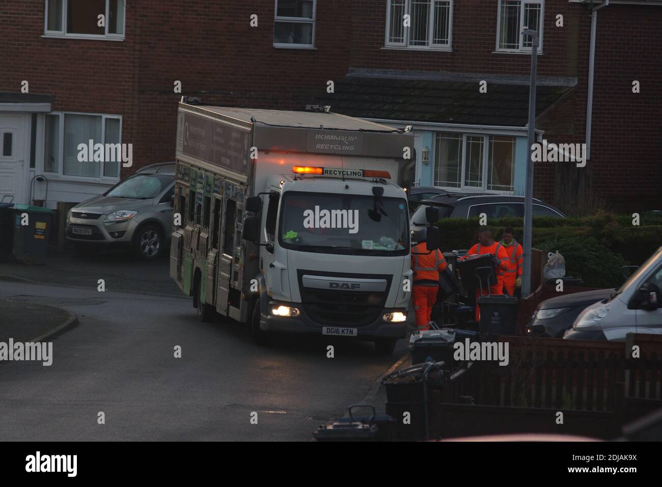 Early morning recycling collection vehicle in Wrexham North Wales Stock Photo