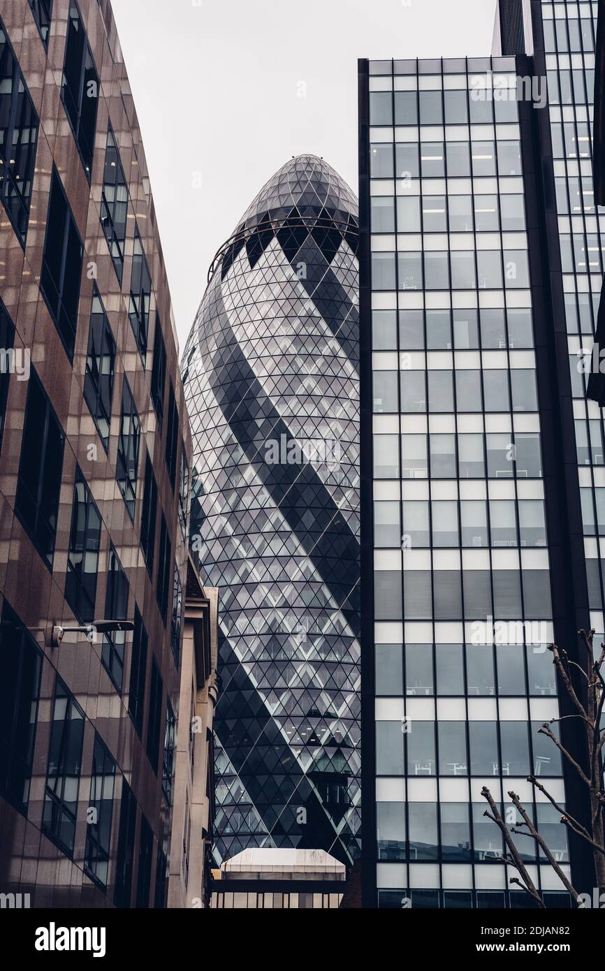 London, UK - November 2020 : Gherkin building and offices seen from Mitre Street Stock Photo
