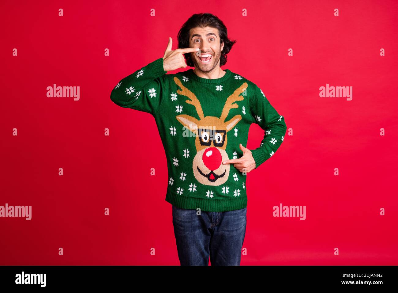 Portrait of his he nice attractive glad funny foolish childish cheerful  cheery brunet guy wearing ugly deer sweater touching nose having fun  isolated Stock Photo - Alamy