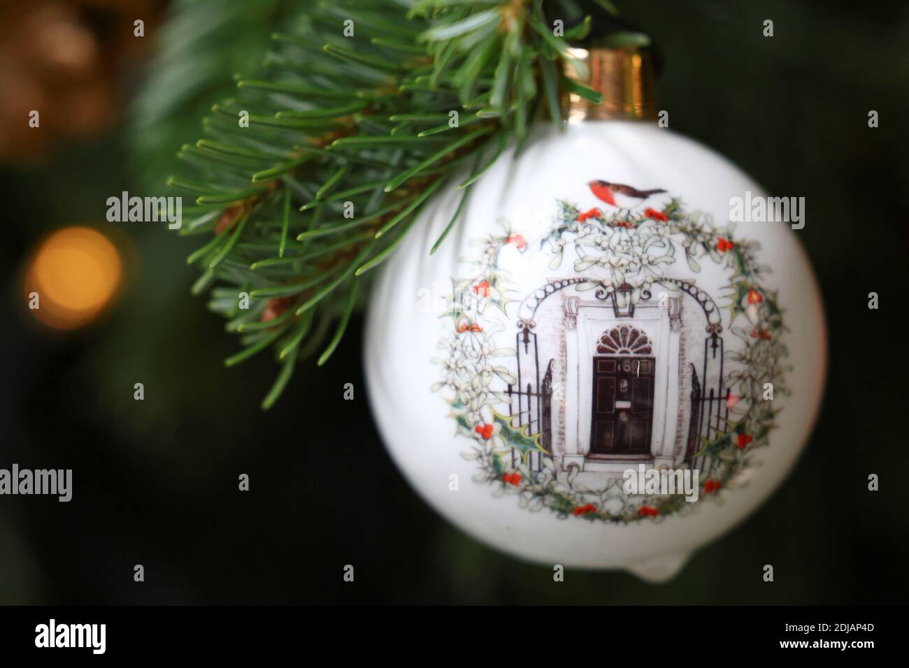 A Christmas ball depicting number 10 Downing Street door hangs on a  Christmas tree outside number 10 Downing Street, in London, Britain,  December 14, 2020. REUTERS/Henry Nicholls Stock Photo - Alamy