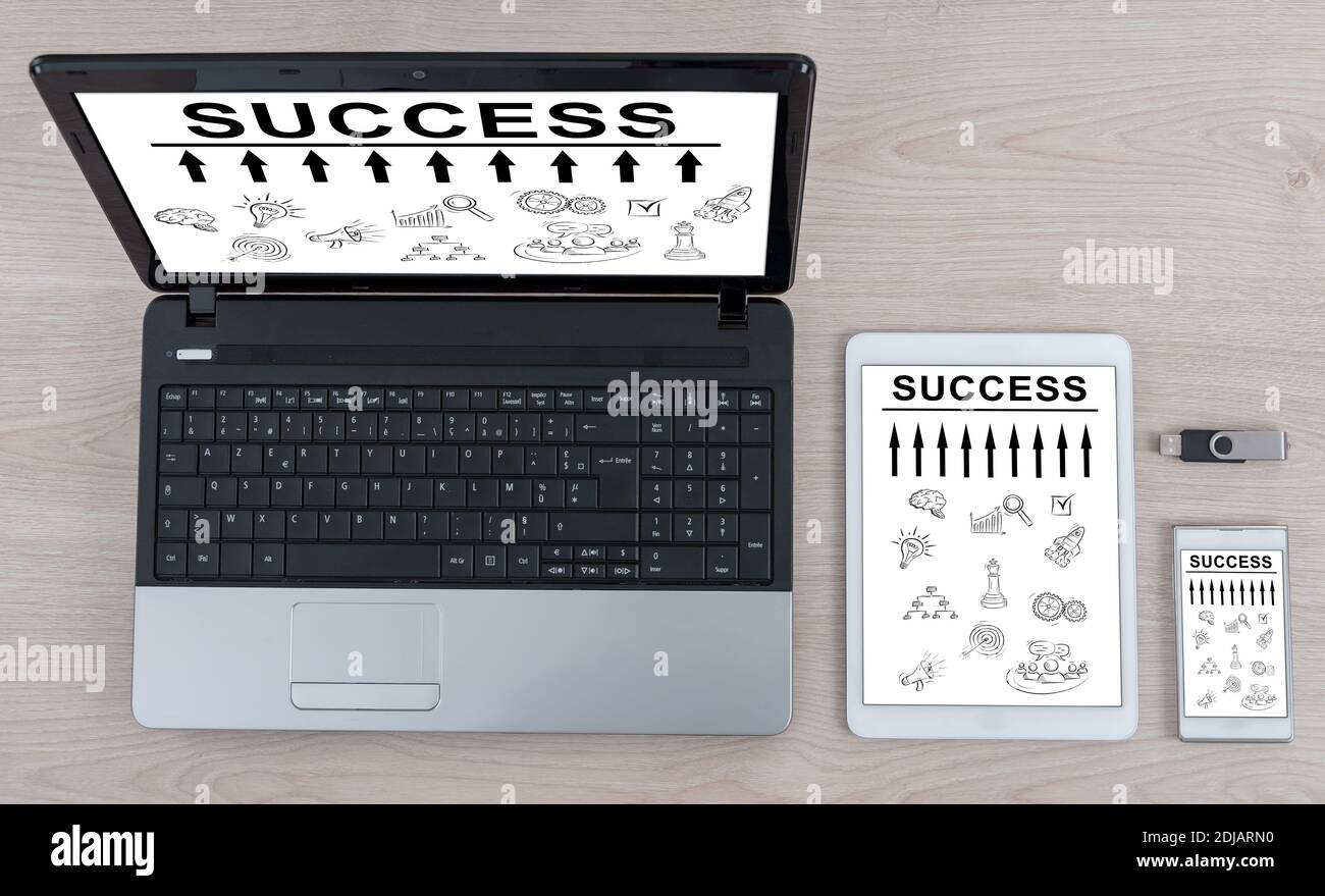 Success concept shown on different information technology devices Stock Photo