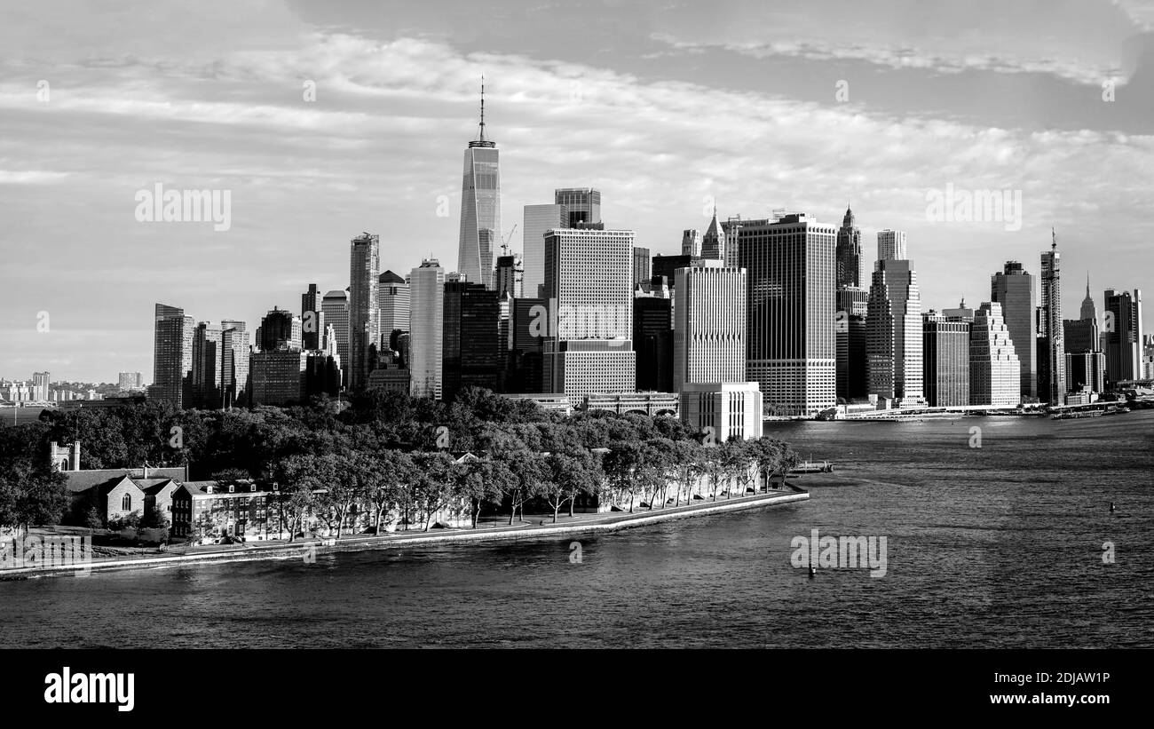 Manhattan Island New York City Skyline Sunrise Morning New One World Trade Centre Governors's Island In Buttermilk Channel Seen From Brooklyn Panorama Stock Photo