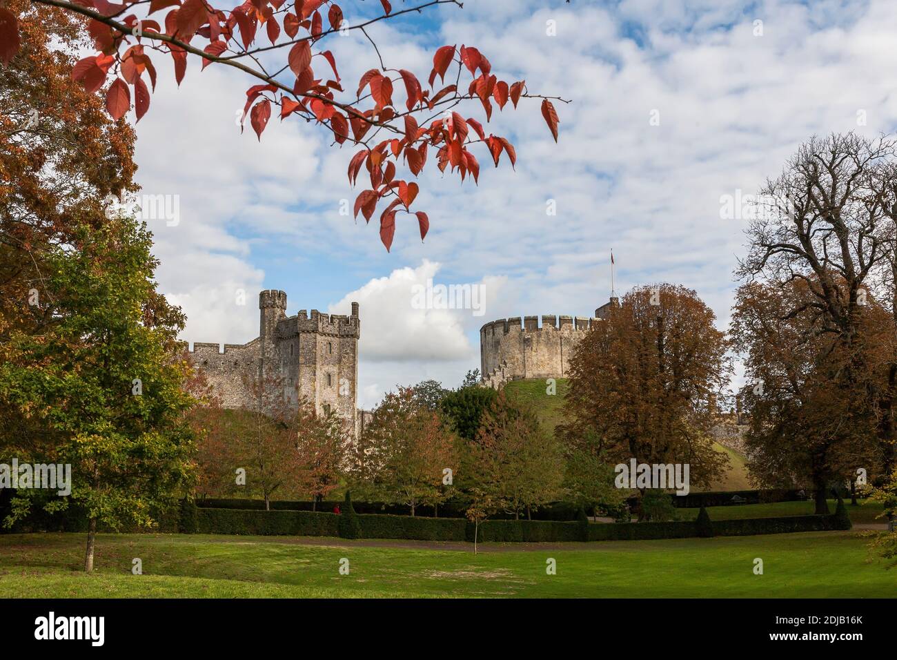 The 13th century Bevis Tower and original Norman 20 metre-high motte, surmounted by the 12th century keep, Arundel Castle, West Sussex, England, UK Stock Photo