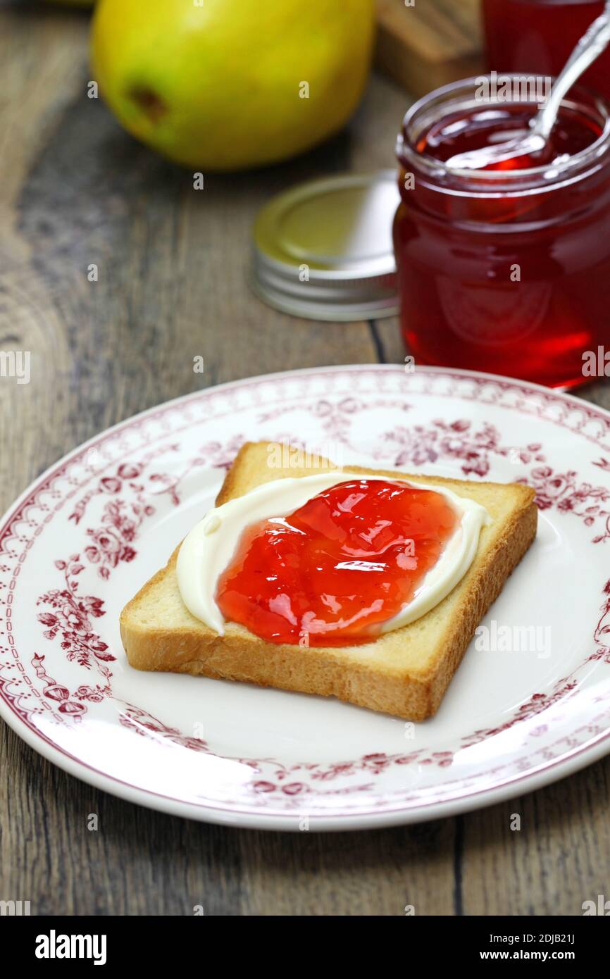 quince jelly and cream cheese spread on toast Stock Photo Alamy