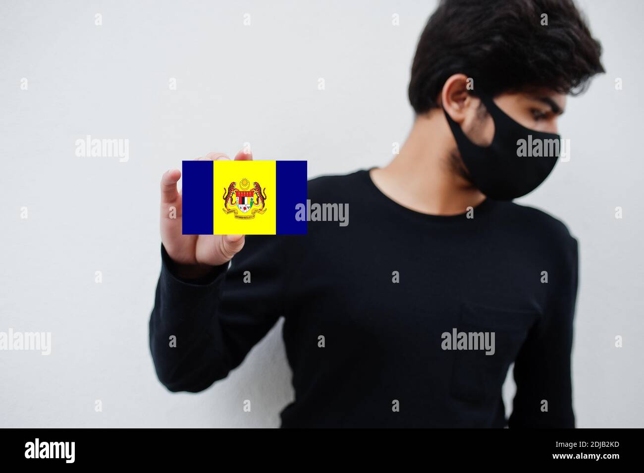 Malay Man Wear All Black With Face Mask Hold Perak Flag In Hand Isolated On White Background States And Federal Territories Of Malaysia Coronavirus C Stock Photo Alamy