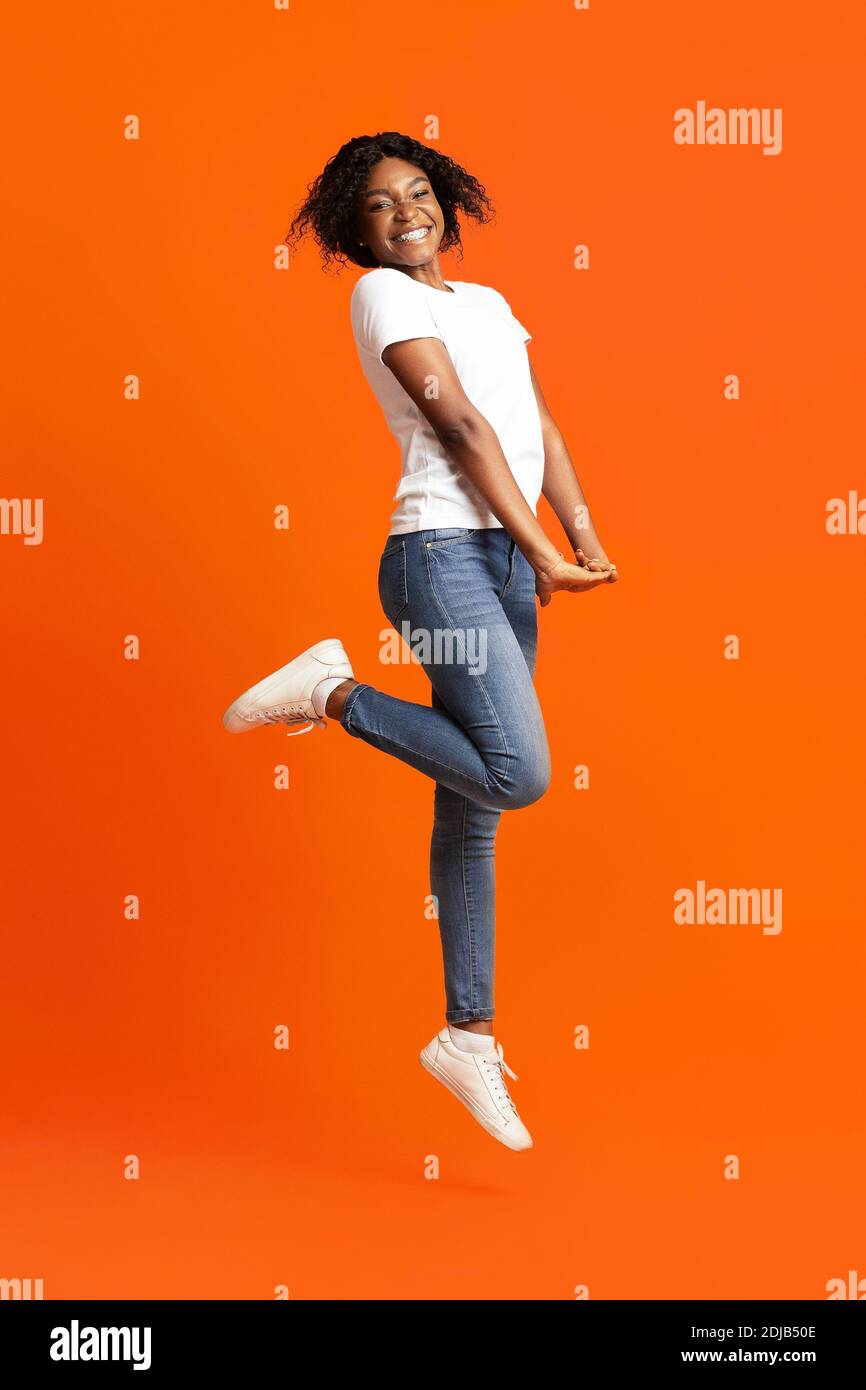 Joyful young woman posing hi-res stock photography and images - Alamy
