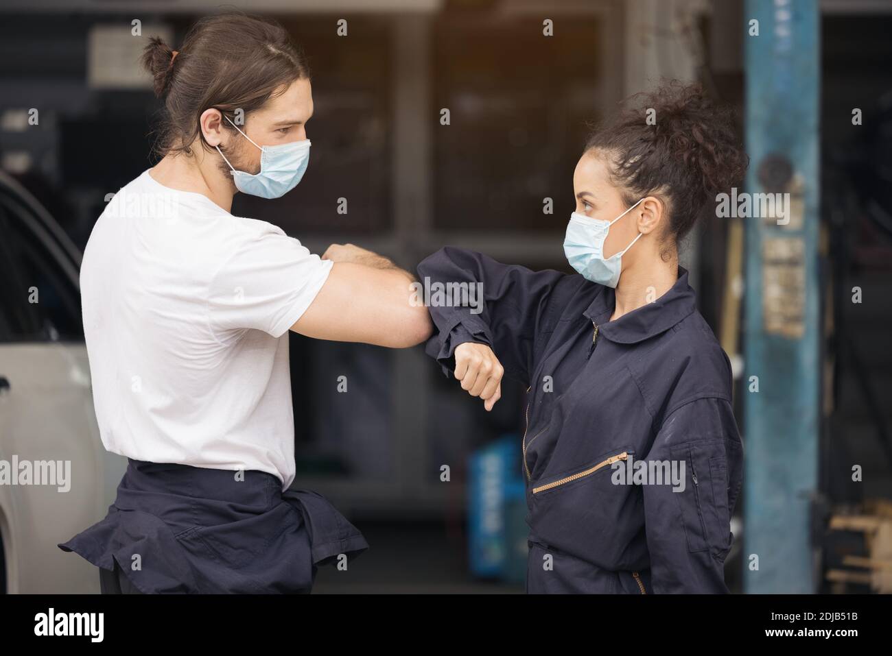 Service Handshake Professional mechanical employee of the car service handshake for agree ...