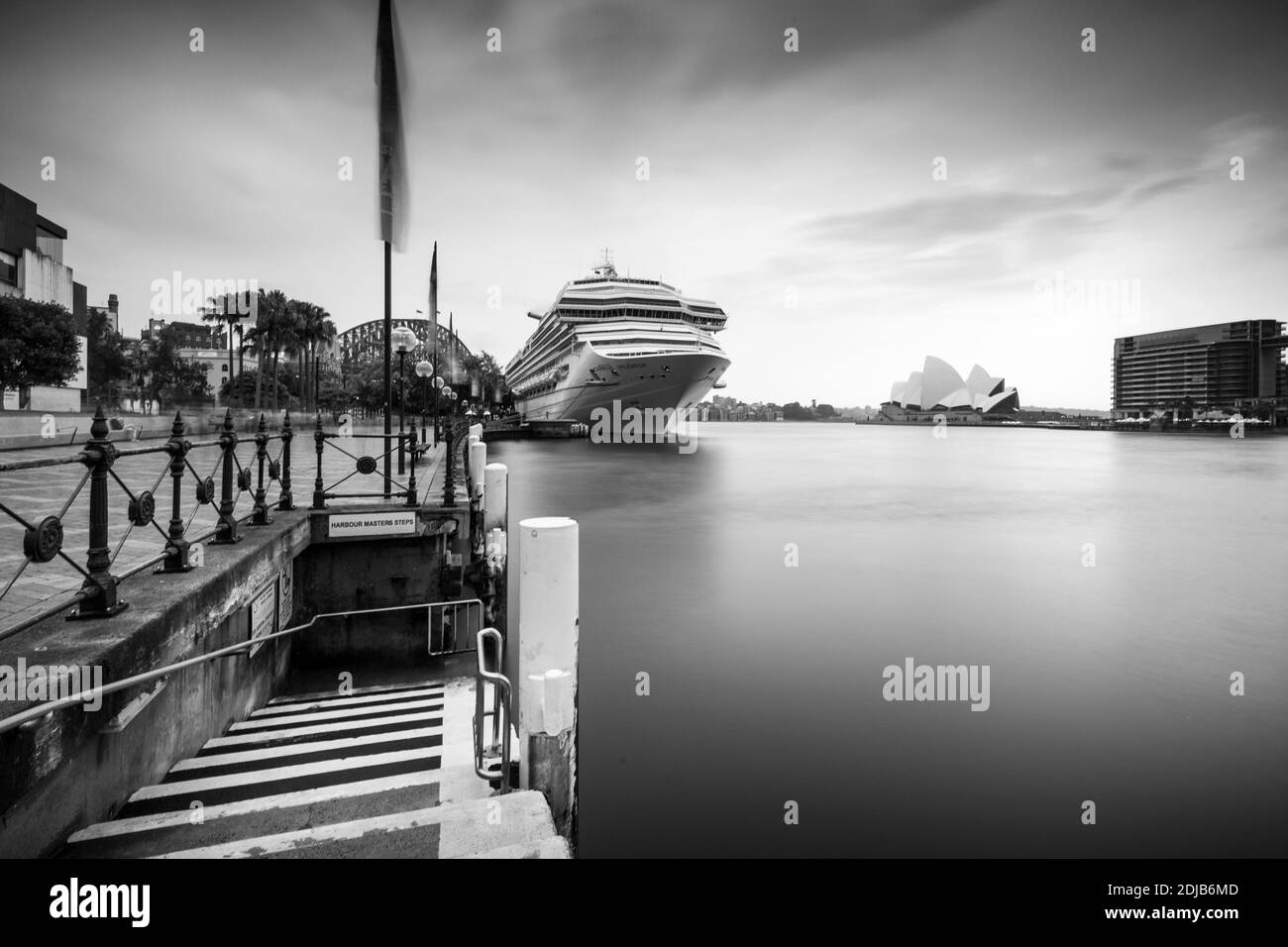 Sydney harbor with cruise ship and opera in back white, longtime exposure Stock Photo