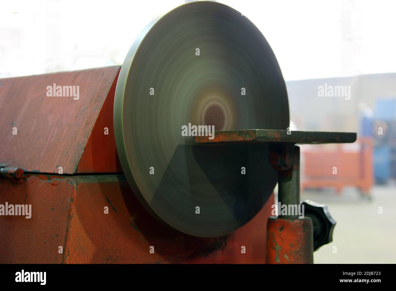 Grinding machine in the factory. Heavy industry. Industrial background