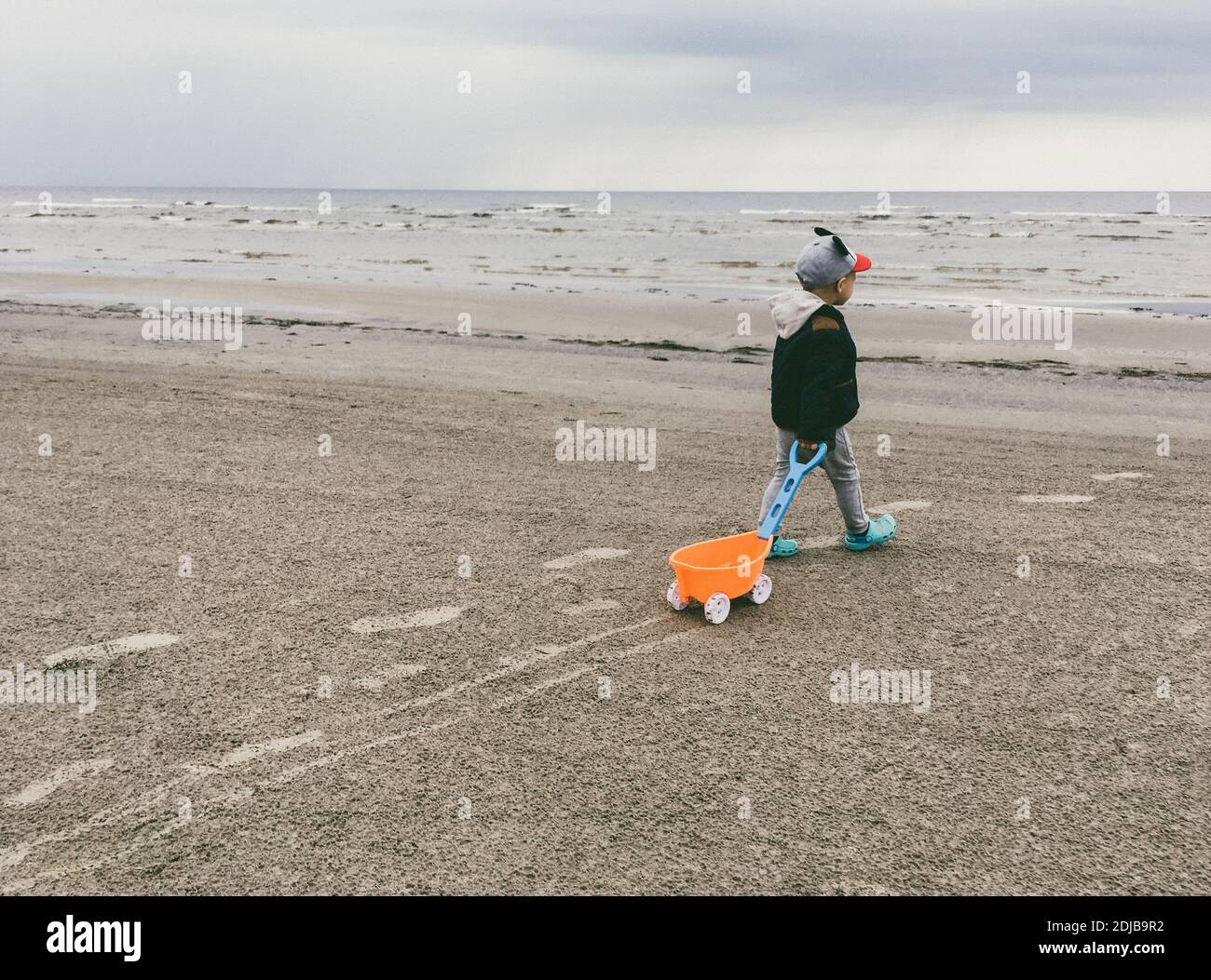 Boy pulling wagon hi-res stock photography and images - Alamy