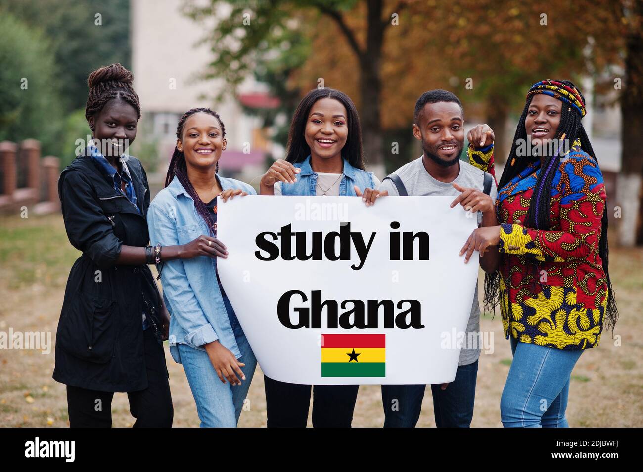 Study in Ghana. Group of five african college students on campus at  university yard hold white blank. Abroad countries for student concept  Stock Photo - Alamy