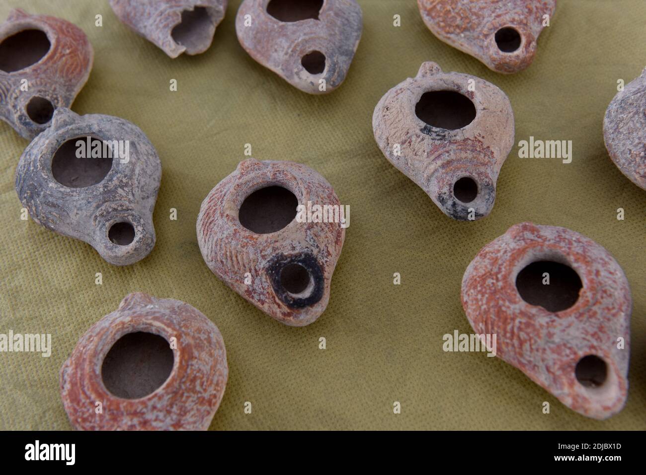 Beit Shemesh, Israel. 14th Dec, 2020. The Israel Antiquities Authority displays ancient Beit Nattif oil lamps at an ancient oil lamp workshop discovered in Beit Shemesh, Israel, on Monday, December 14, 2020. Hundreds of ceramic oil lamps, molds and figurine fragments from 1,600-1,700 years ago were found during excavation before the building of a new neighborhood in Beit Shemesh. Photo by Debbie Hill/UPI Credit: UPI/Alamy Live News Stock Photo