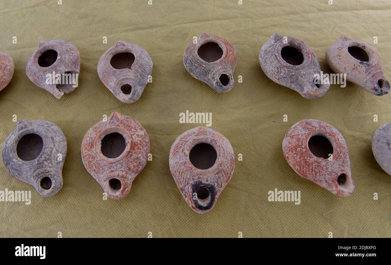 Beit Shemesh, Israel. 14th Dec, 2020. The Israel Antiquities Authority displays Beit Nattif oil lamps found found in an ancient oil lamp workshop in Beit Shemesh, Israel, on Monday, December 14, 2020. Hundreds of ceramic oil lamps, molds and figurine fragments from 1,600-1,700 years ago were found during excavation before the building of a new neighborhood in Beit Shemesh. Photo by Debbie Hill/UPI Credit: UPI/Alamy Live News Stock Photo