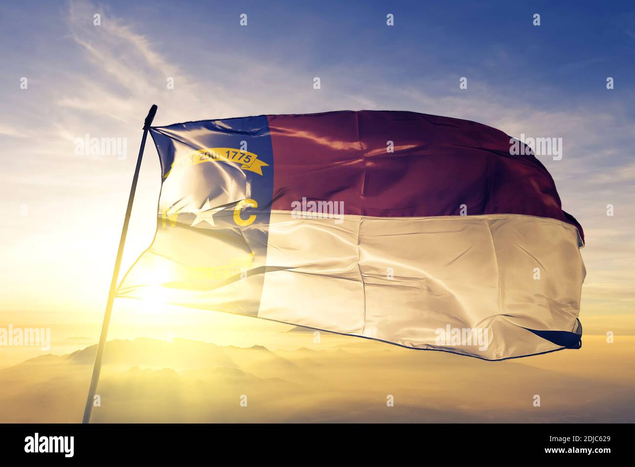 North Carolina state of United States flag waving on the top sunrise ...