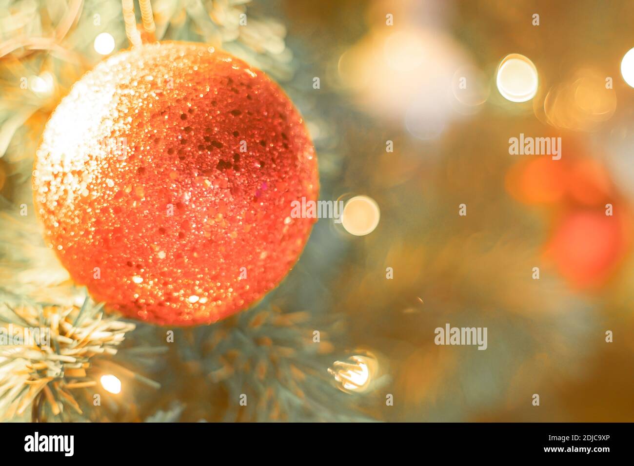 Christmas Tree red Ball And gold Bokeh Background Stock Photo - Alamy