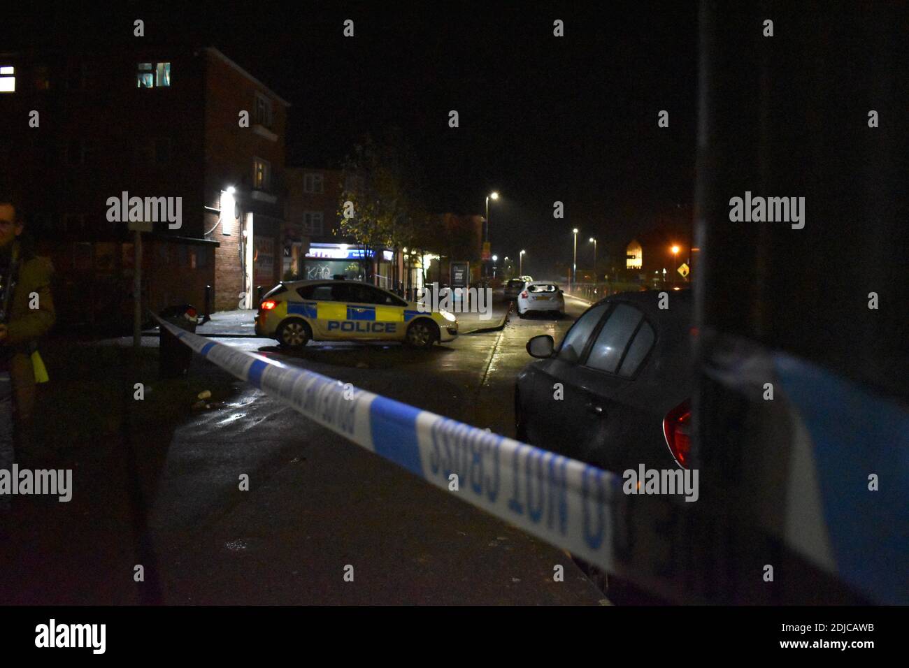 Police cordoned off coronation square in Southcote Lane, Reading Berkshire. Charles Dye / Alamy Live News Stock Photo