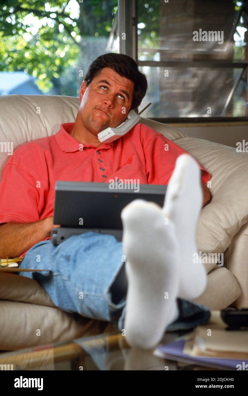 1990s middle-aged man works from home, USA Stock Photo