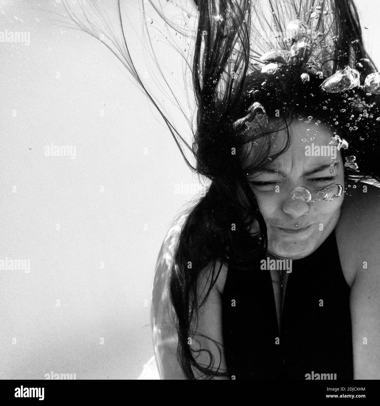 Woman Swimming In Pool Stock Photo - Alamy