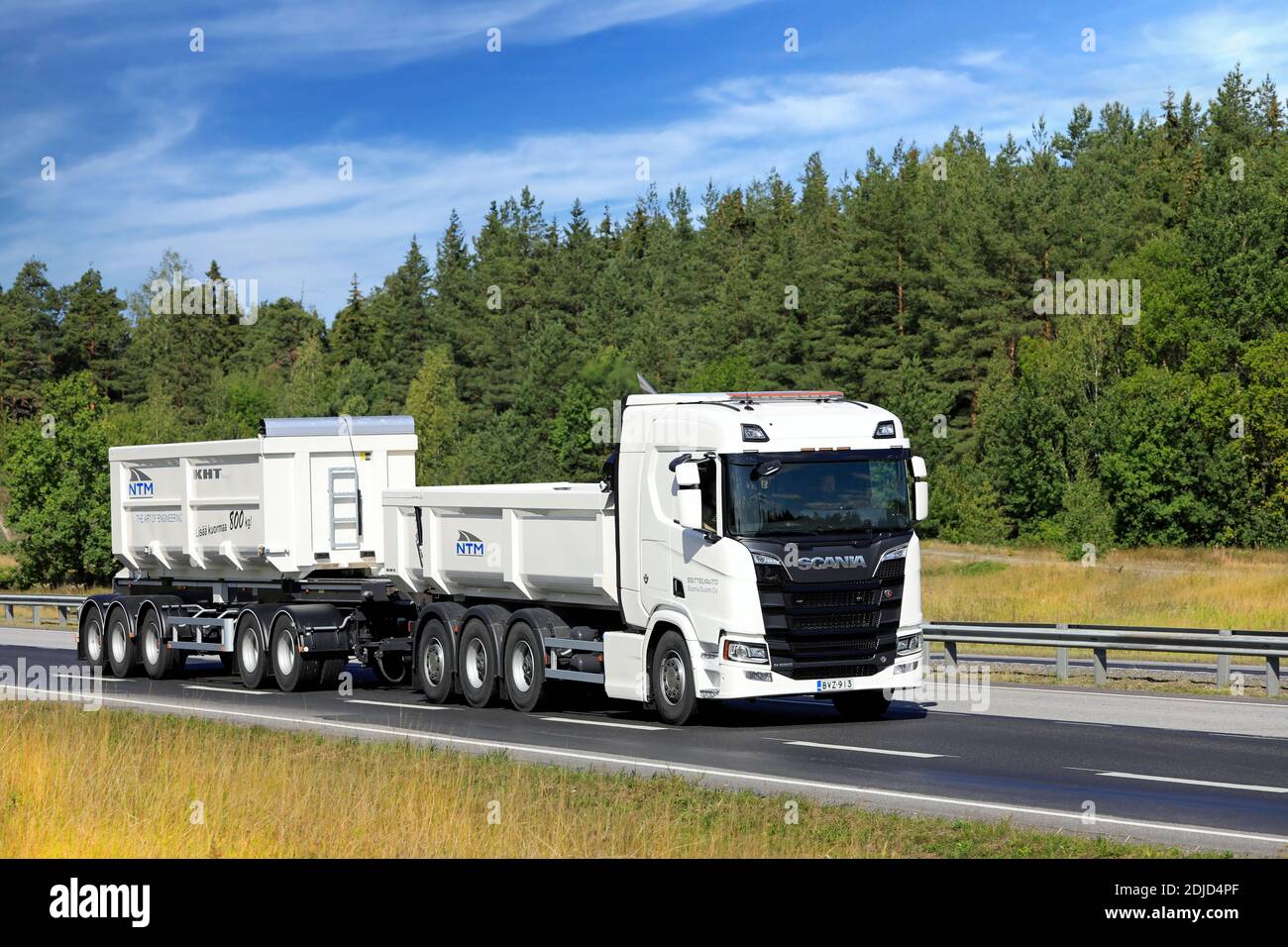 White Next Generation Scania R650 truck pulls gravel trailer on road test. Scania in Finland 70 years tour. Turku, Finland. August 24, 2019. Stock Photo